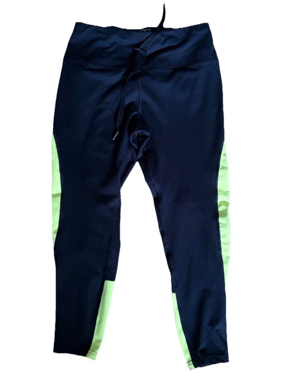 Layer8 black leggings with neon green accents. Size M